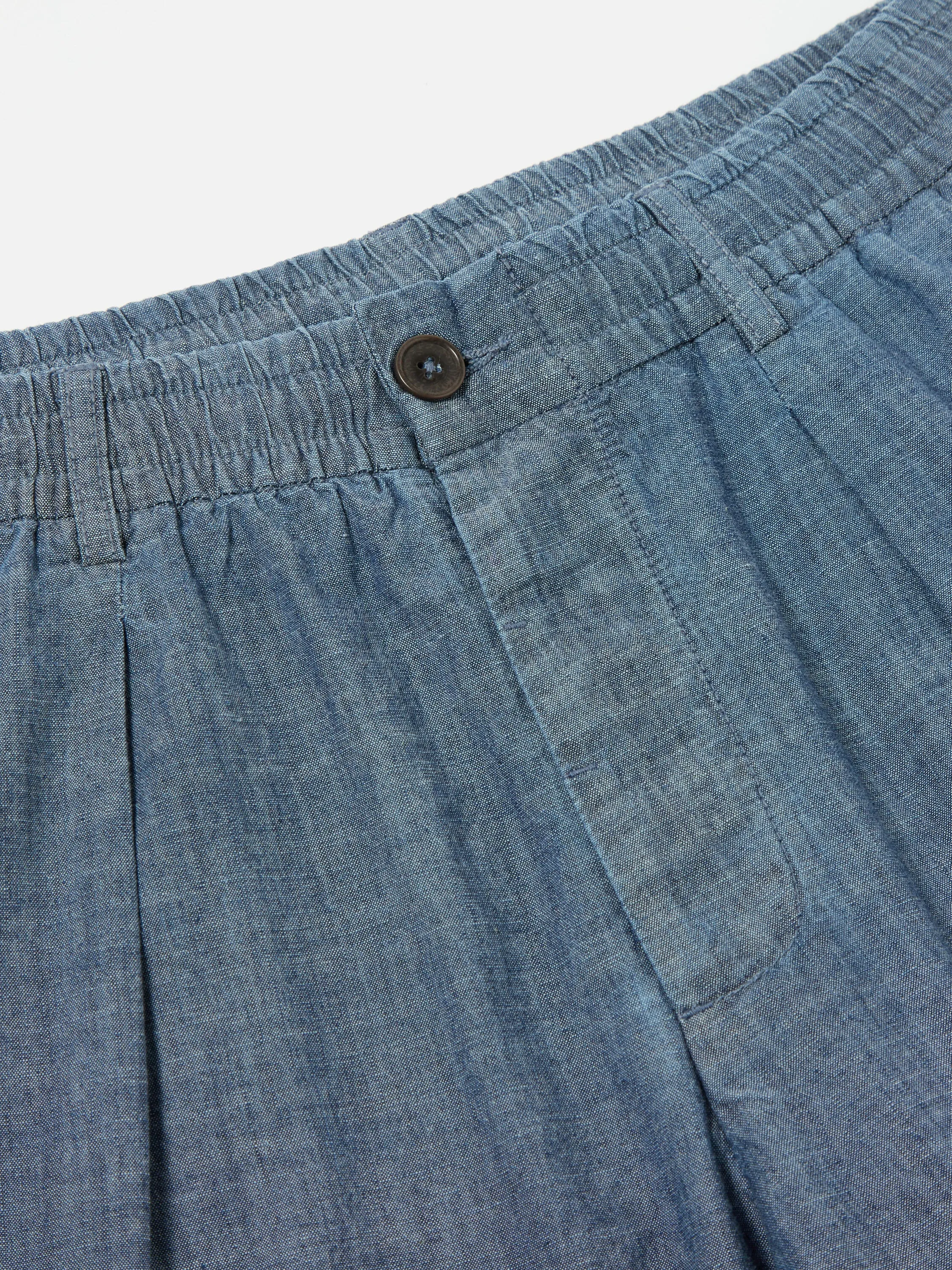 Universal Works Patched Pleated Track Pant in Indigo Chambray/Hickory Stripe Denim