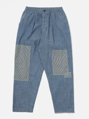 Universal Works Patched Pleated Track Pant in Indigo Chambray/Hickory Stripe Denim