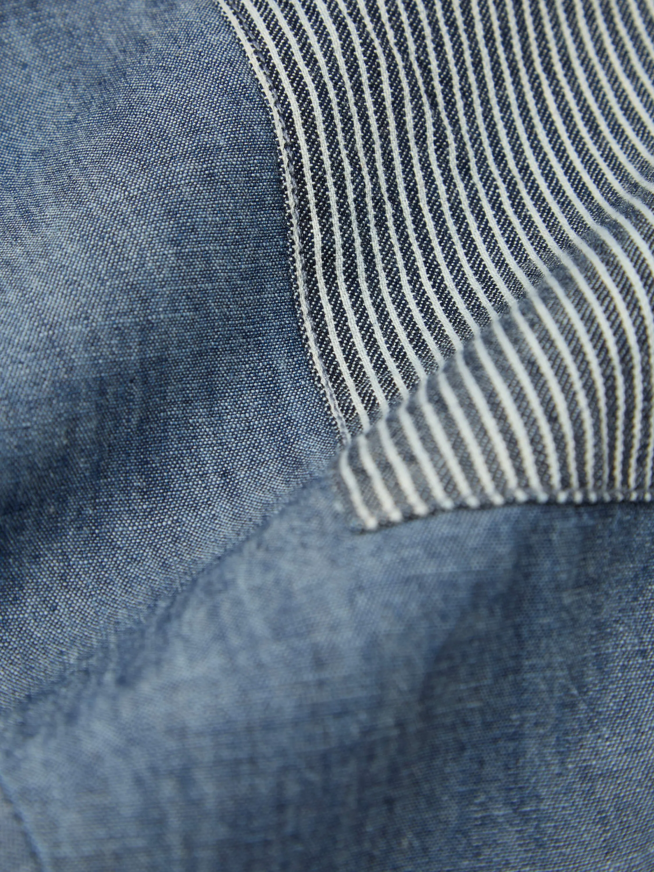 Universal Works Patched Pleated Track Pant in Indigo Chambray/Hickory Stripe Denim