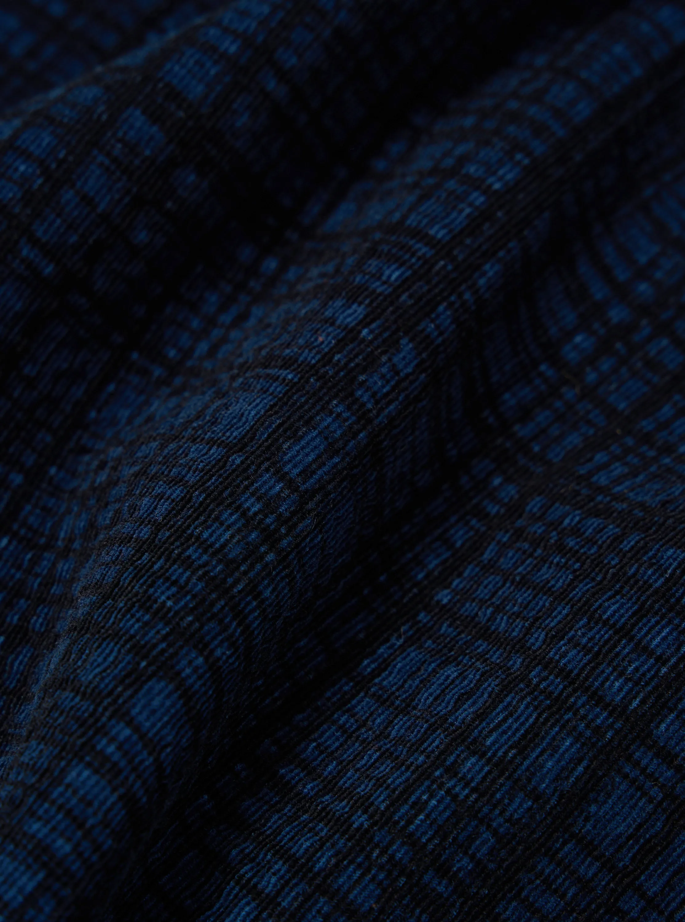 Universal Works Pleated Track Pant in Navy Check Cord Seersucker
