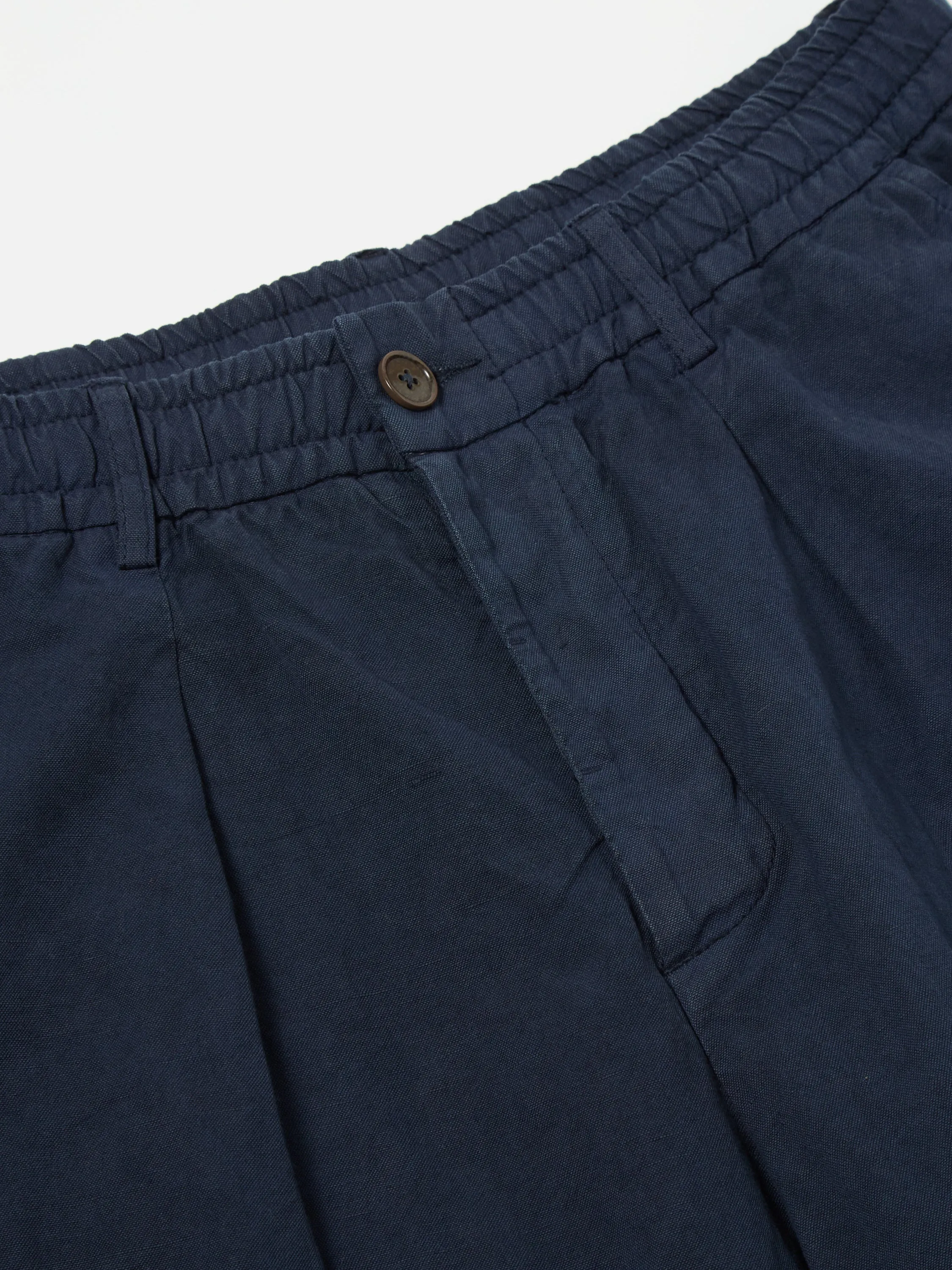 Universal Works Pleated Track Pant in Navy Linen Slub Weave