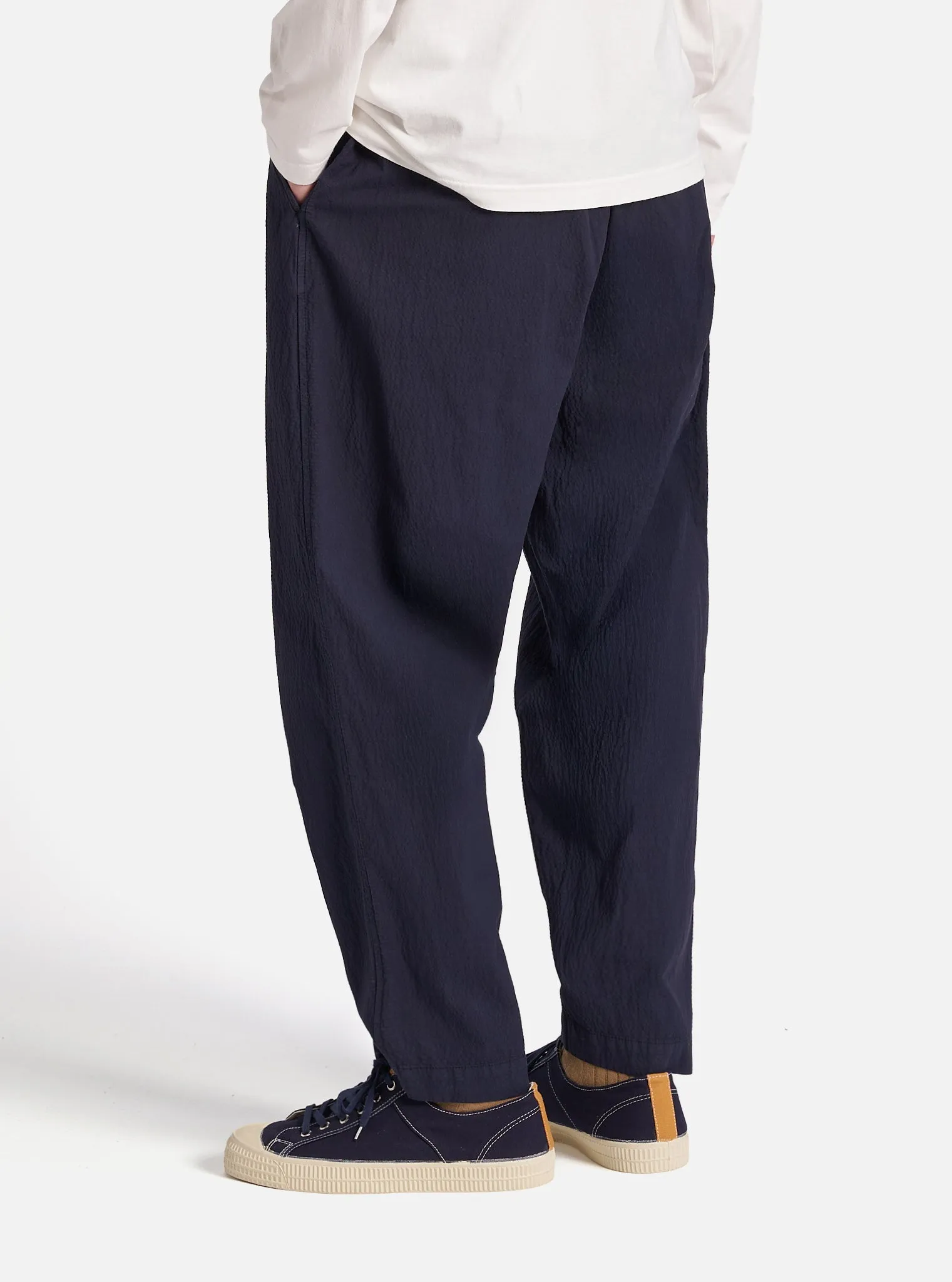Universal Works Pleated Track Pant in Navy Seersucker II