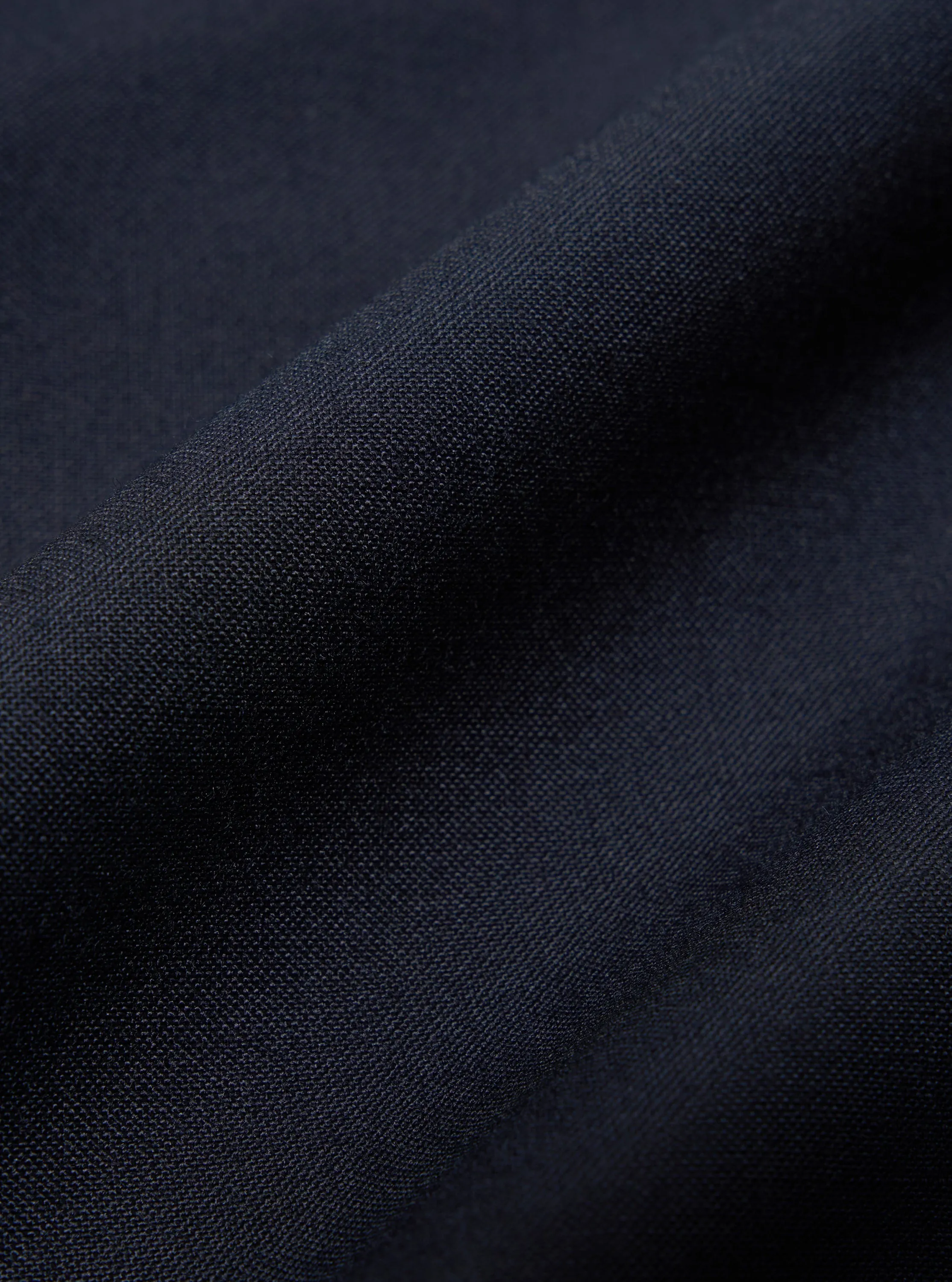 Universal Works Pleated Track Pant in Navy Tropical Suiting