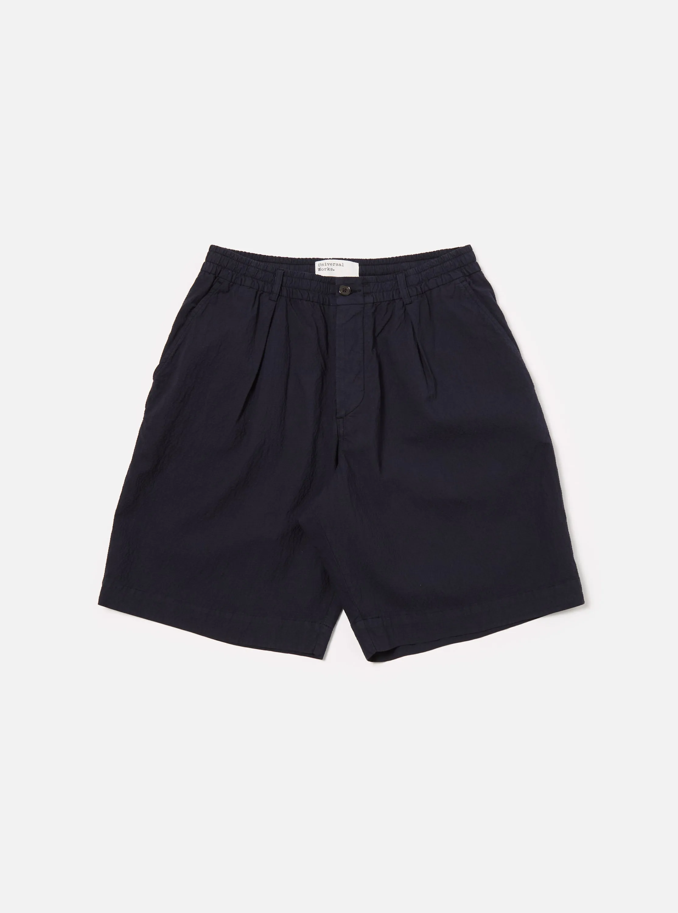 Universal Works Pleated Track Short in Navy Seersucker II