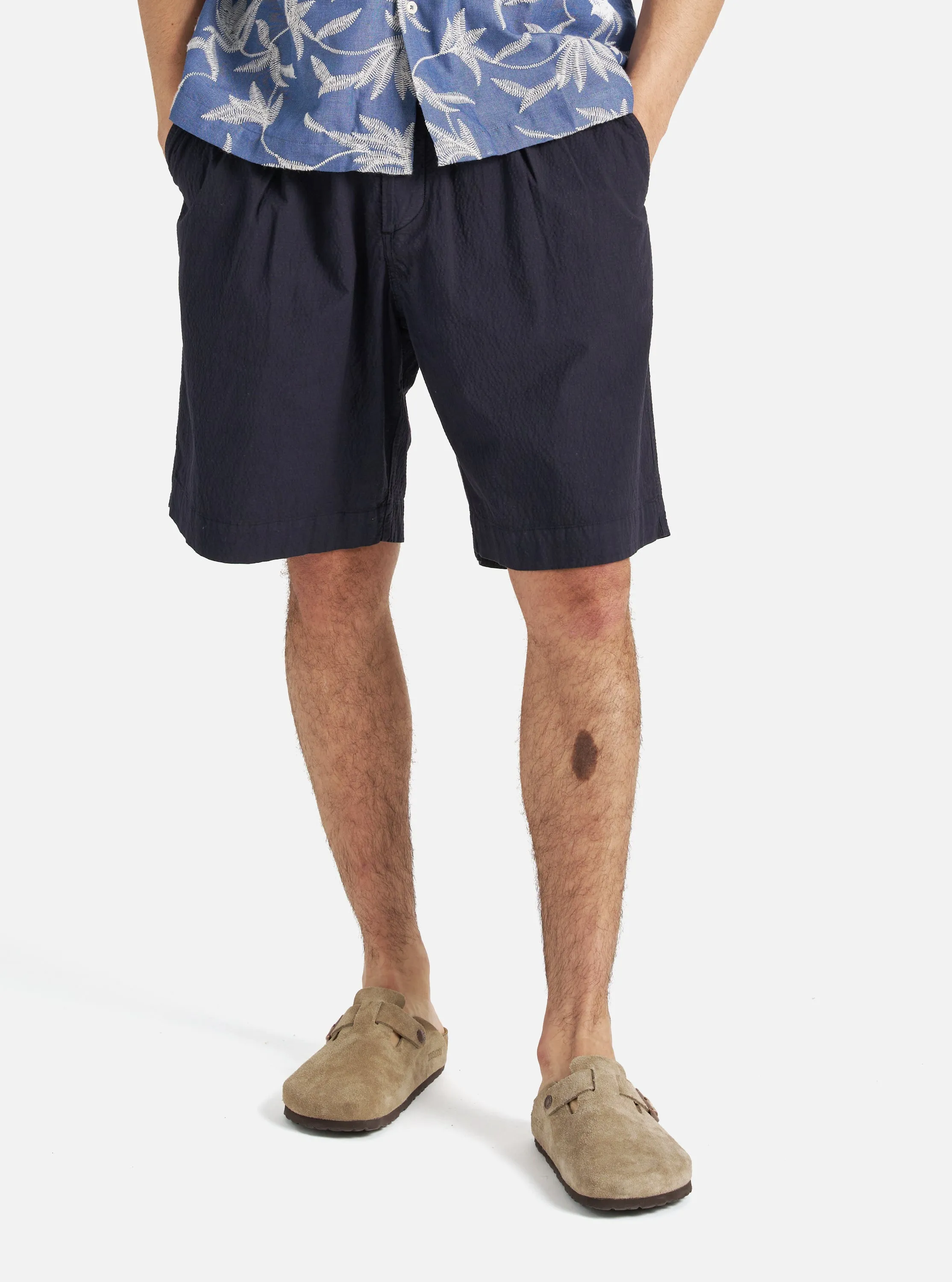 Universal Works Pleated Track Short in Navy Seersucker II