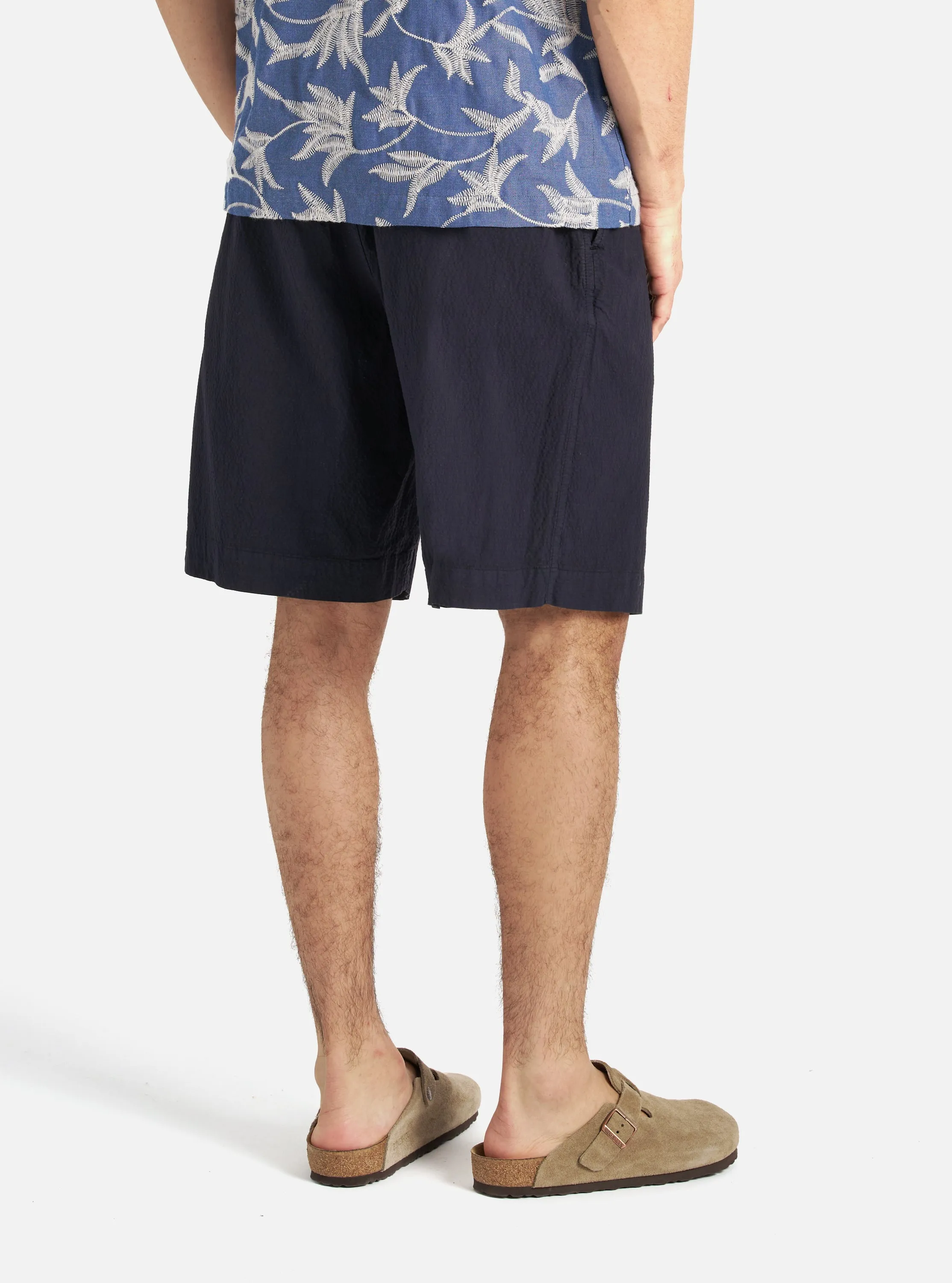 Universal Works Pleated Track Short in Navy Seersucker II