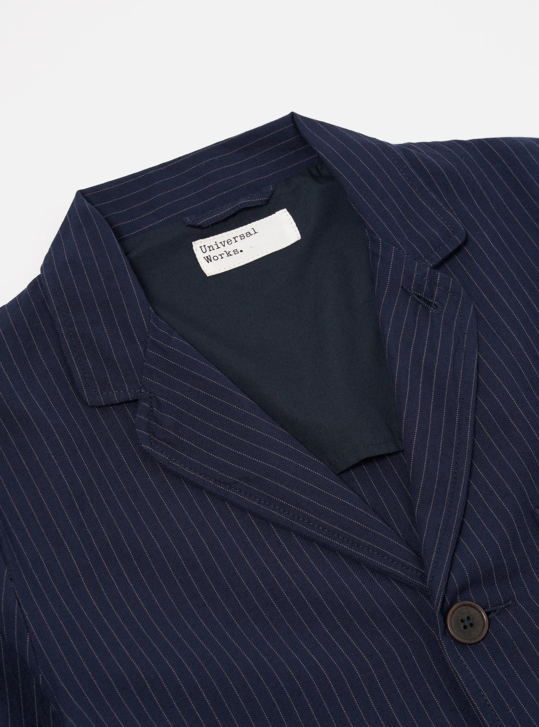 Universal Works Three Button Jacket in Navy Cotton Pinstripe