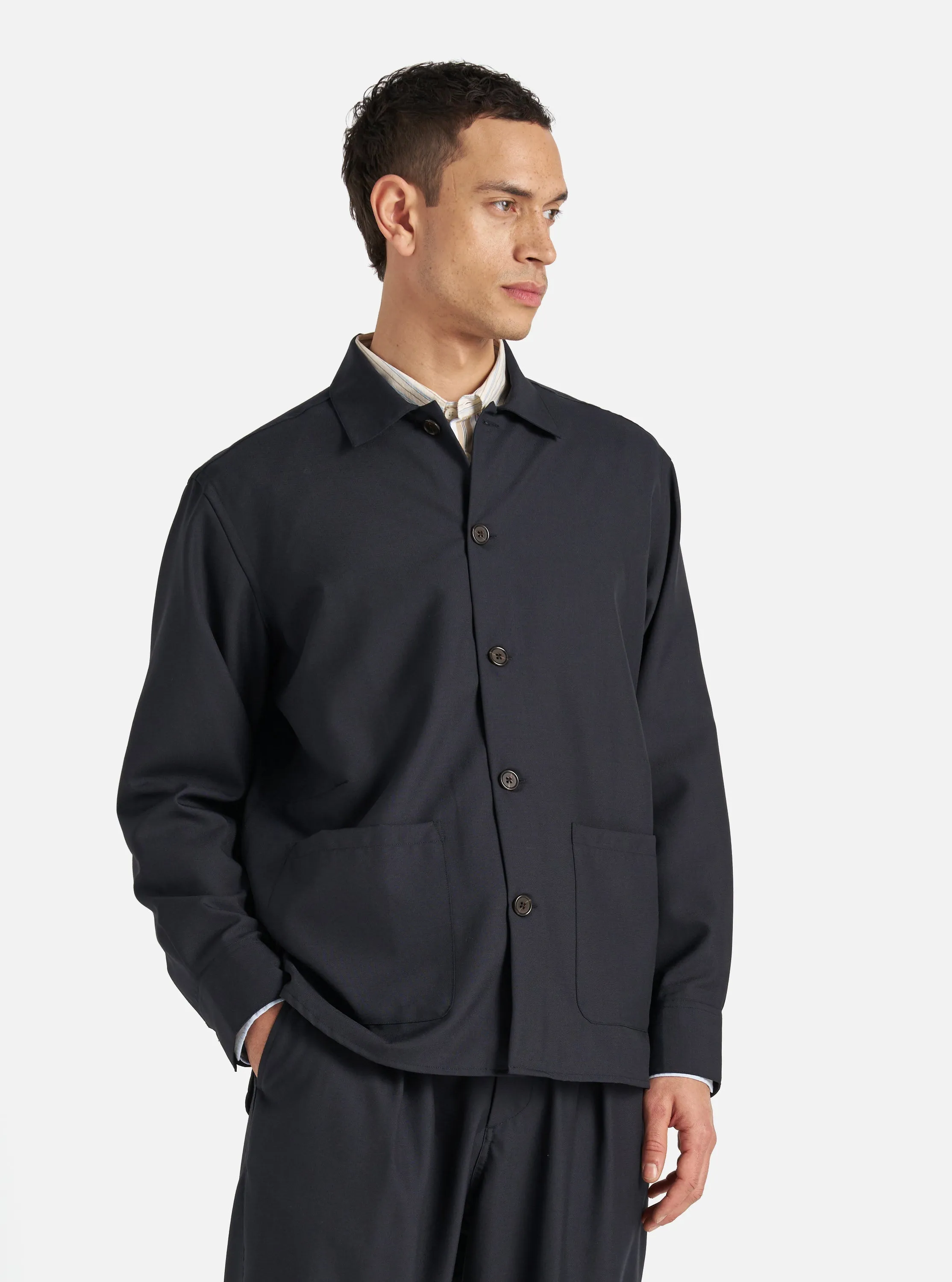 Universal Works Travail Overshirt in Navy Tropical Suiting