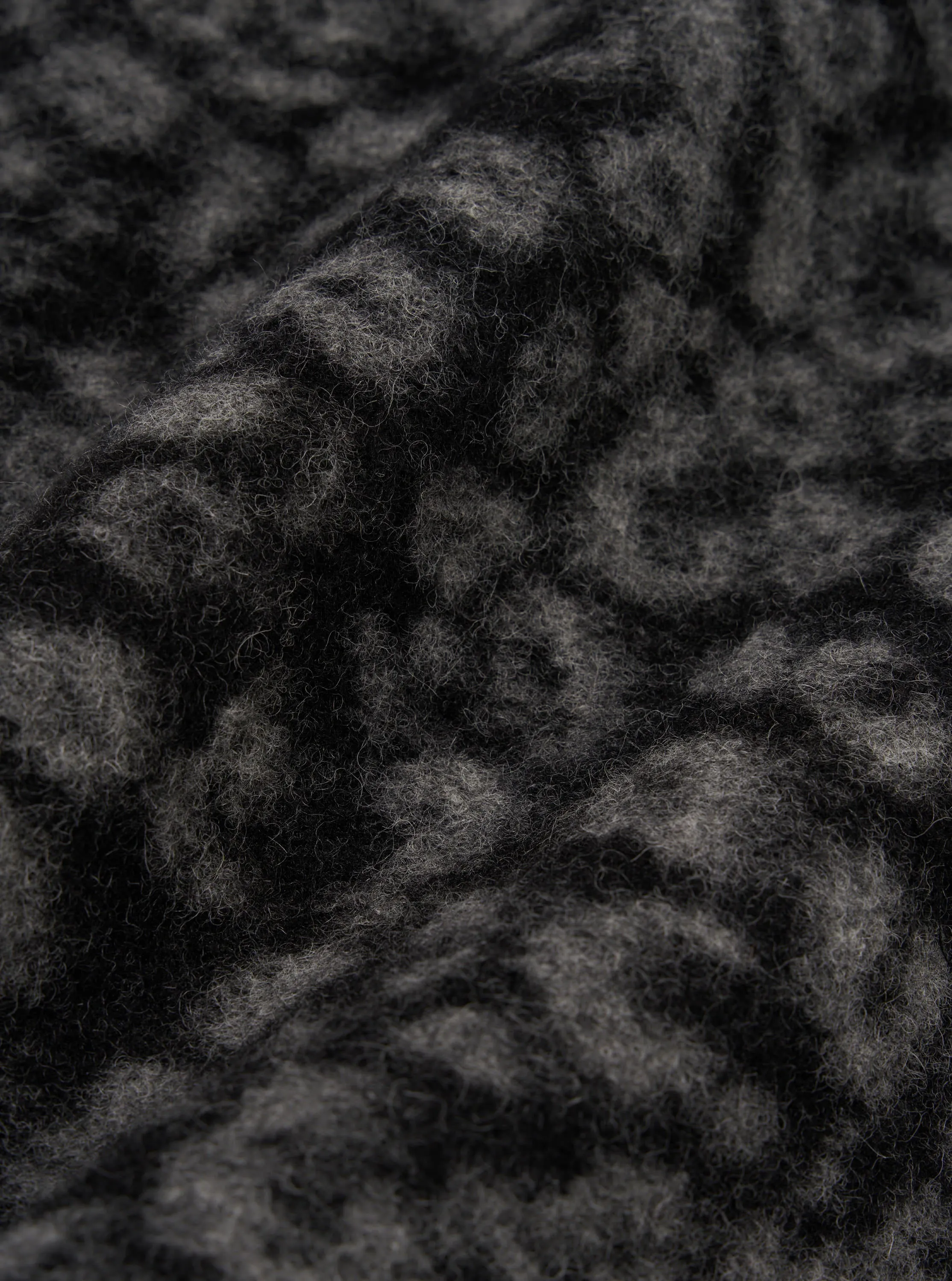 Universal Works Zip Waistcoat in Black/Charcoal Leopard Fleece